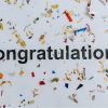 Congratulations with confetti background